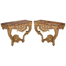 Pair 18th Century French carved gilt wood console tables.