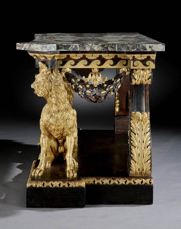 A GEORGE II PARCEL GILT SIDE TABLE ATTRIBUTED TO WILLIAM KENT