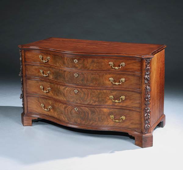 A LARGE GEORGE II MAHOGANY SERPENTINE CHEST OF DRAWERS