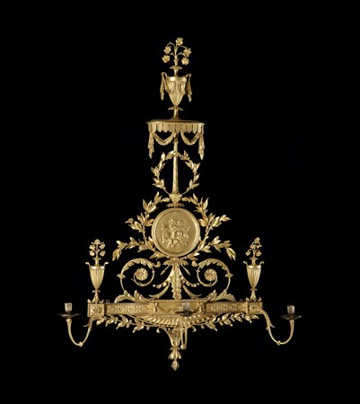 A PAIR OF GEORGE III GILTWOOD WALL LIGHTS IN THE MANNER OF ROBERT ADAM
