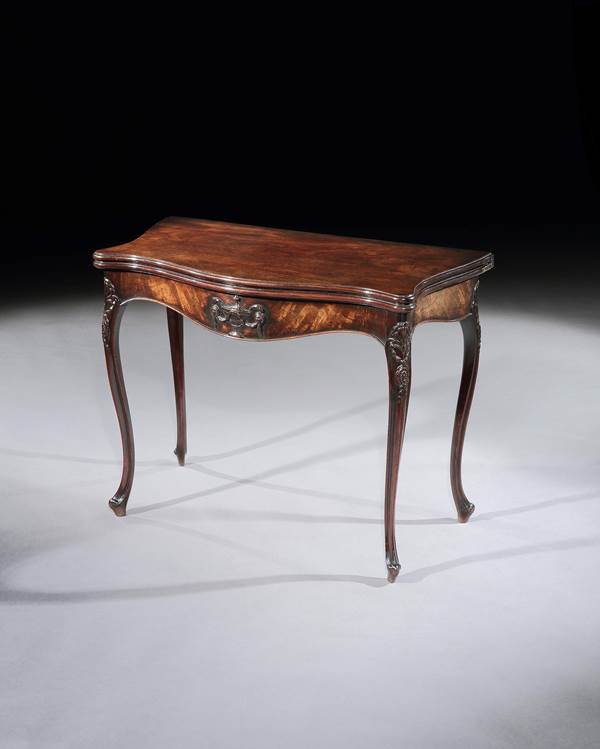 A PAIR OF GEORGE III MAHOGANY CARD TABLES