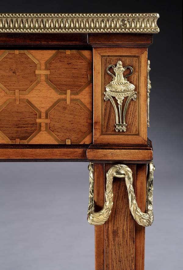 A GEORGE III WRITING TABLE ATTRIBUTED TO CHRISTOPHER FUHRLOHG