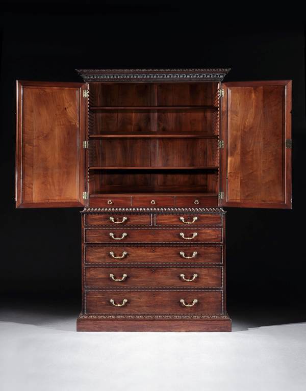 A GEORGE III MAHOGANY CABINET ATTRIBUTED TO WILLIAM VILE