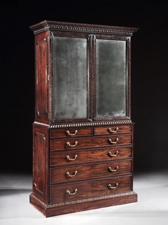 A GEORGE III MAHOGANY CABINET ATTRIBUTED TO WILLIAM VILE