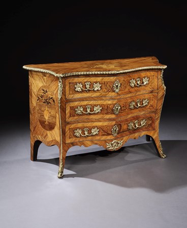 A GEORGE III KINGWOOD COMMODE ATTRIBUTED TO PIERRE LANGLOIS