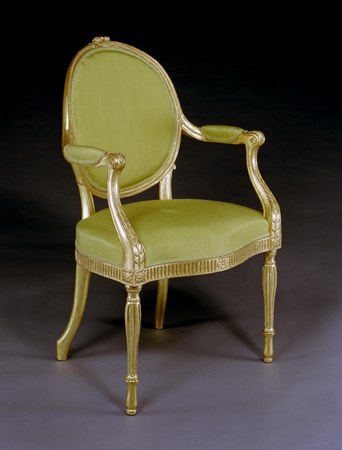 A GEORGE III GILTWOOD ARMCHAIR ATTRIBUTED TO THOMAS CHIPPENDALE