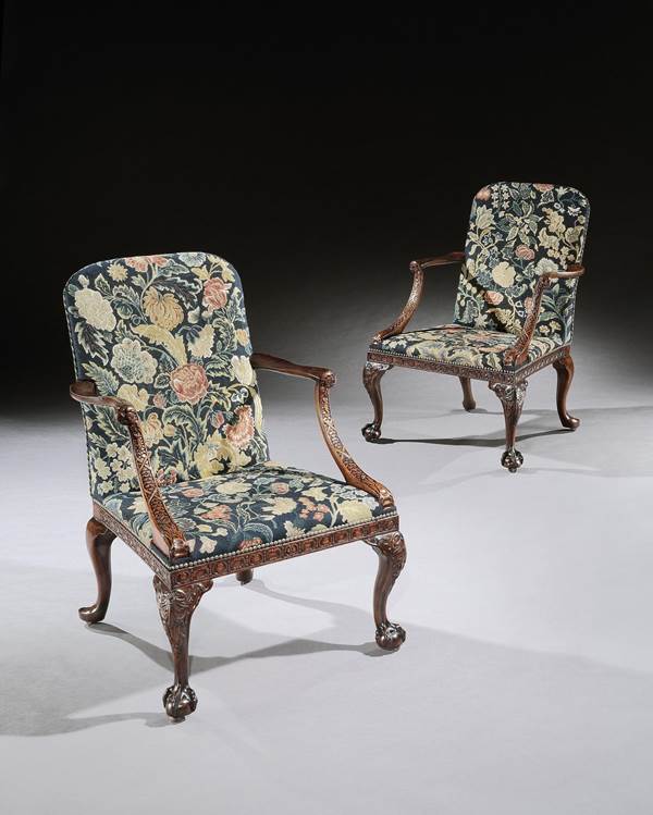A PAIR OF GEORGE II MAHOGANY OPEN ARMCHAIRS