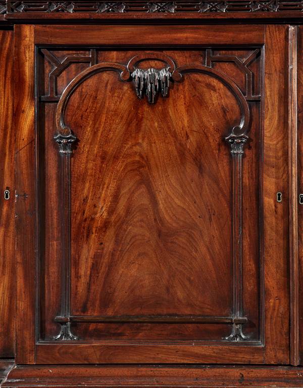 AN IMPORTANT GEORGE II MAHOGANY CABINET TO A DESIGN BY THOMAS CHIPPENDALE