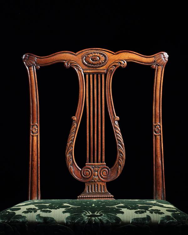 A SET OF TWELVE GEORGE III DINING CHAIRS ATTRIBUTED TO THOMAS CHIPPENDALE