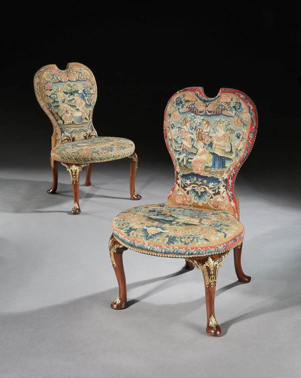 A PAIR OF GEORGE II MAHOGANY SIDE CHAIRS ATTRIBUTED TO PETER ALEXANDER