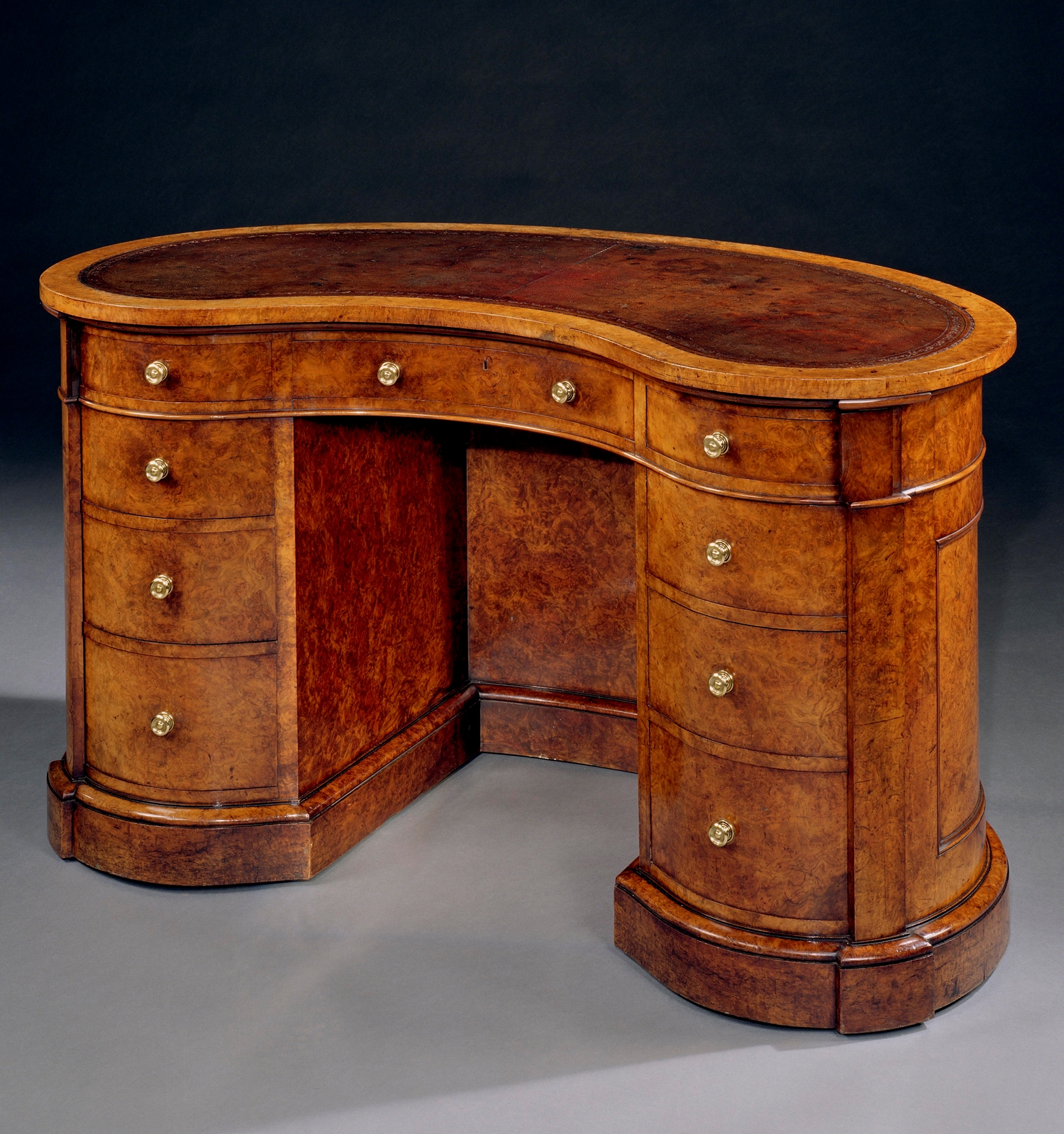 A VICTORIAN BURR WALNUT KIDNEY DESK BY HOLLAND & SONS Ronald Phillips