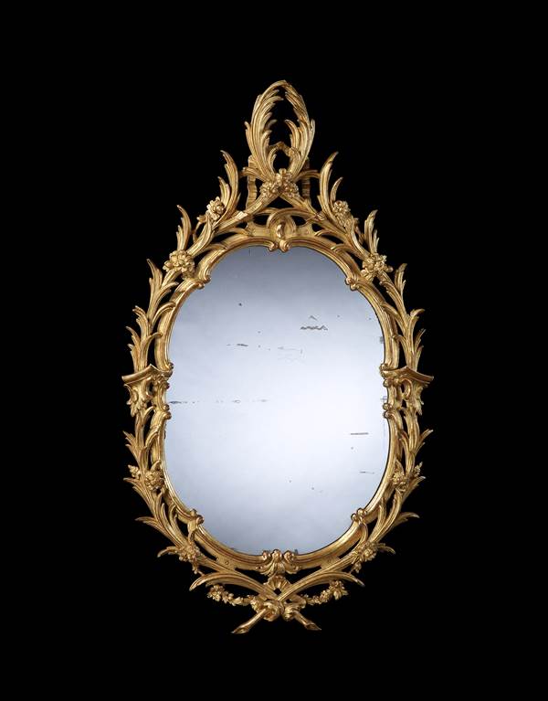 A PAIR OF GEORGE II OVAL GILTWOOD MIRRORS