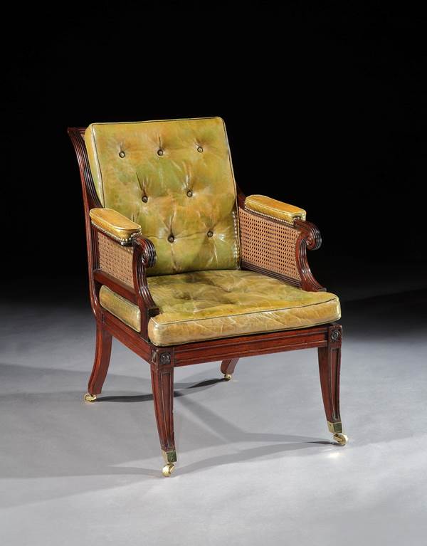 A PAIR OF REGENCY MAHOGANY BERGERE CHAIRS