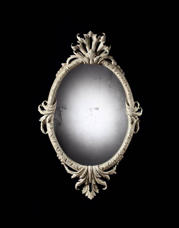 A PAIR OF GEORGE II PAINTED OVAL MIRRORS