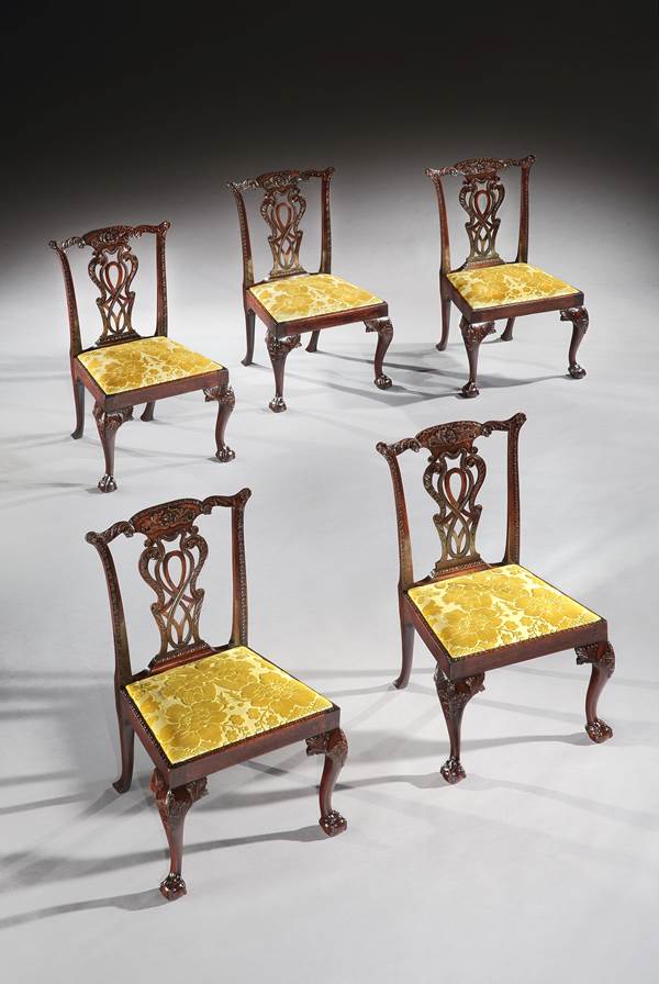 A SET OF TEN GEORGE II MAHOGANY DINING CHAIRS