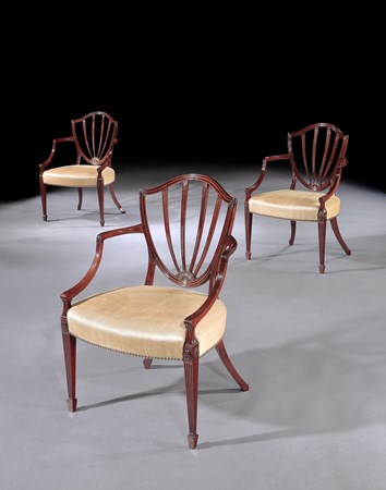 A SET OF SIX GEORGE III MAHOGANY OPEN ARMCHAIRS ATTRIBUTED TO GILLOWS
