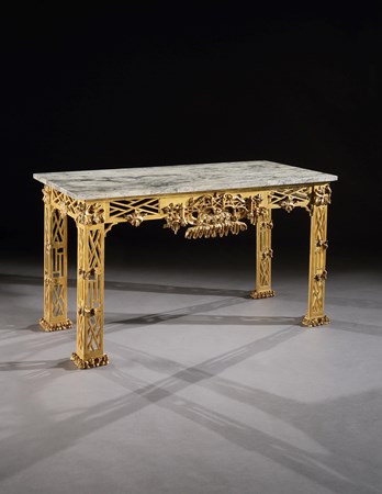 A PAIR OF GEORGE II GILTWOOD SIDE TABLES TO A DESIGN BY THOMAS CHIPPENDALE