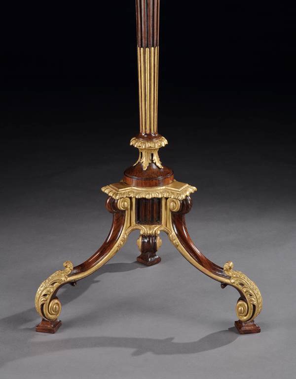 A PAIR OF GEORGE III ROSEWOOD TORCHÈRES ATTRIBUTED TO THOMAS CHIPPENDALE