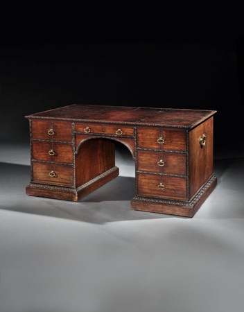 A GEORGE II MAHOGANY LIBRARY TABLE ATTRIBUTED TO WILLIAM HALLETT