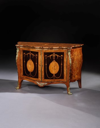 A GEORGE III COMMODE ATTRIBUTED TO PIERRE LANGLOIS
