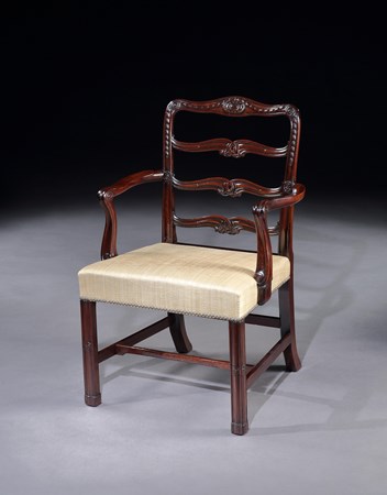 A PAIR OF GEORGE II MAHOGANY LADDER BACK ARMCHAIRS