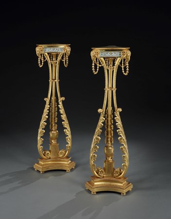 A PAIR OF GEORGE III GILTWOOD TORCHERES