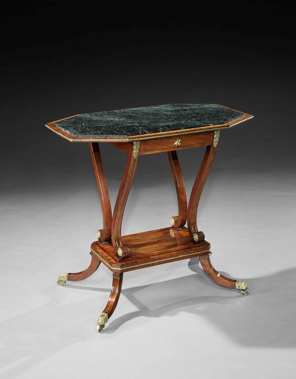 A PAIR OF REGENCY BRASS MOUNTED MAHOGANY SIDE TABLES