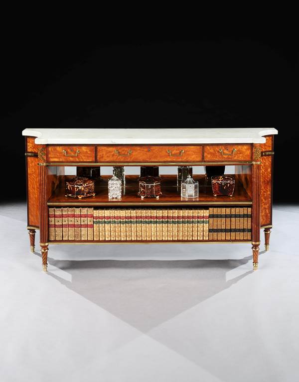 A GEORGE III SATINWOOD AND PURPLEHEART CABINET ATTRIBUTED TO GILLOWS
