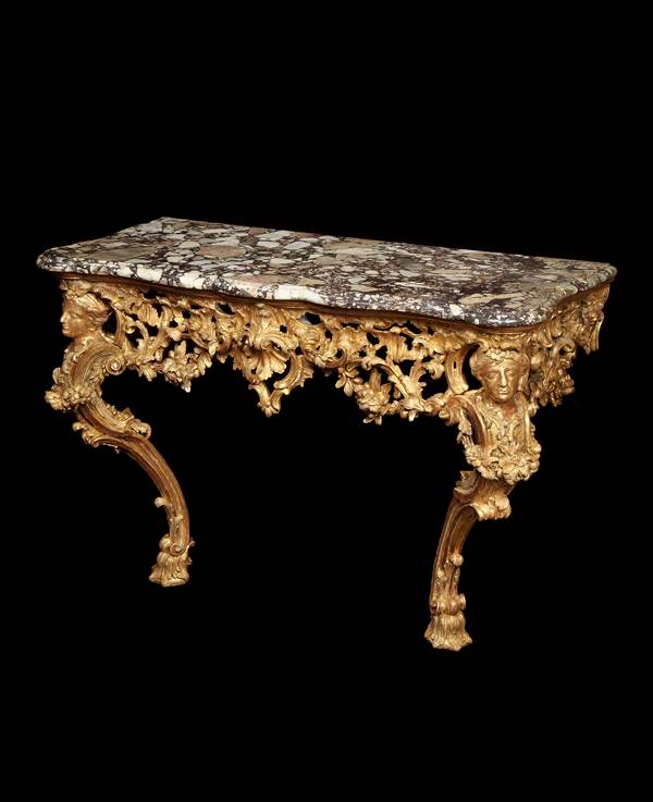 A GEORGE II GILTWOOD CONSOLE TABLE ATTRIBUTED TO MATTHIAS LOCK