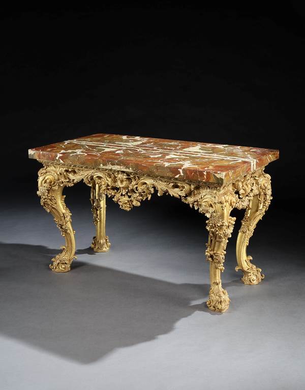 A GEORGE II GILTWOOD SIDE TABLE ATTRIBUTED TO MATTHIAS LOCK
