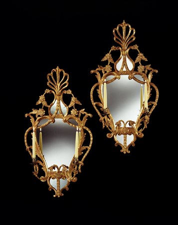 A PAIR OF GEORGE III CARVED GILTWOOD GIRANDOLES
