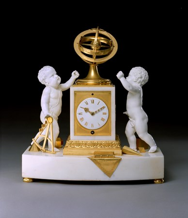 A REGENCY WHITE MARBLE PORCELAIN AND ORMOLU CLOCK BY VULLIAMY