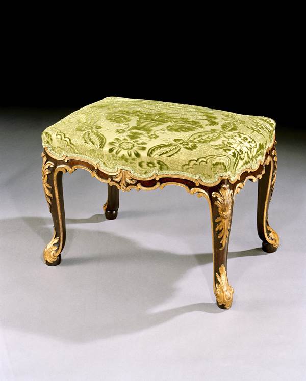 A GEORGE II PARCEL GILT MAHOGANY STOOL ATTRIBUTED TO WRIGHT AND ELWICK