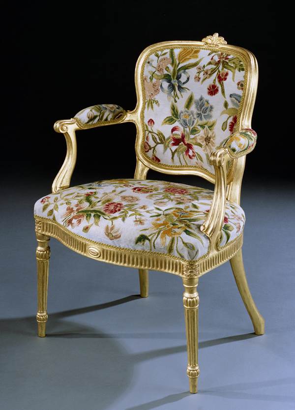 A PAIR OF GEORGE III GILTWOOD ARMCHAIRS ATTRIBUTED TO THOMAS CHIPPENDALE 