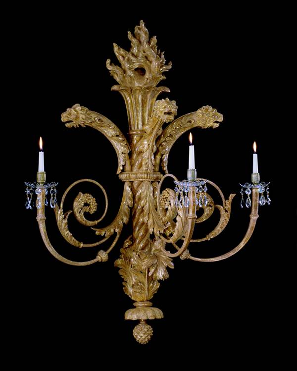 A PAIR OF REGENCY CARVED GILTWOOD WALL LIGHTS