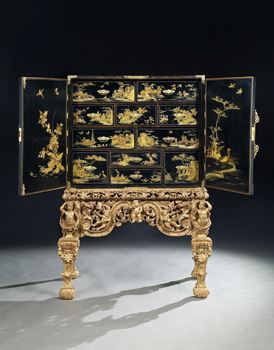 A CHARLES II BLACK JAPANNED CABINET ON GILTWOOD STAND