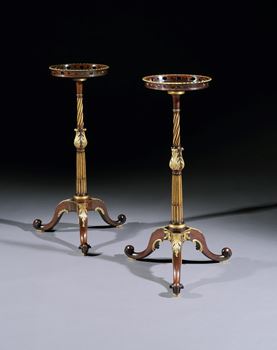 A NEAR PAIR OF GEORGE II PARCEL GILT MAHOGANY TORCHÈRES