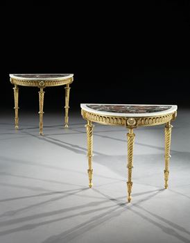 A PAIR OF GEORGE III DEMI-LUNE GILTWOOD SIDE TABLES