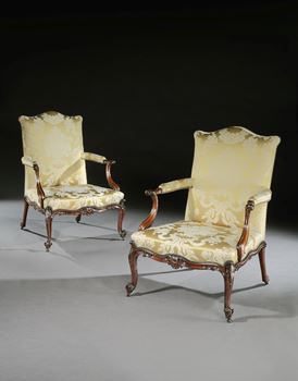 A PAIR OF GEORGE III MAHOGANY ARMCHAIRS ALMOST CERTAINLY BY THOMAS CHIPPENDALE
