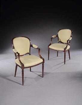 A PAIR OF GEORGE III MAHOGANY ARMCHAIRS ATTRIBUTED TO JOHN LINNELL
