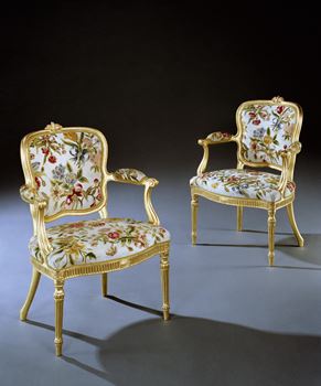 A PAIR OF GEORGE III GILTWOOD ARMCHAIRS ATTRIBUTED TO THOMAS CHIPPENDALE 
