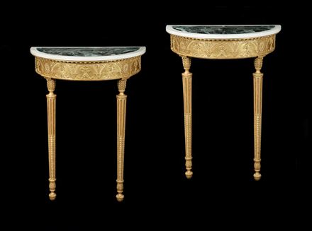 A PAIR OF GEORGE III GILTWOOD CONSOLE TABLES ATTRIBUTED TO ROBERT ADAM