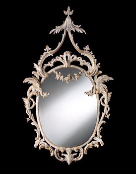 AN EXCEPTIONAL OVAL LOOKING GLASS