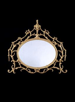 A GEORGE III GILTWOOD AND CARTON PIERRE OVERMANTEL MIRROR