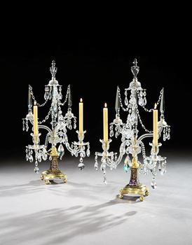 A PAIR OF GEORGE III ORMOLU MOUNTED CUT GLASS TWO LIGHT CANDELABRA BY WILLIAM PARKER & SON