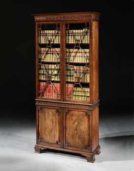 A PAIR OF GEORGE II MAHOGANY BOOKCASES
