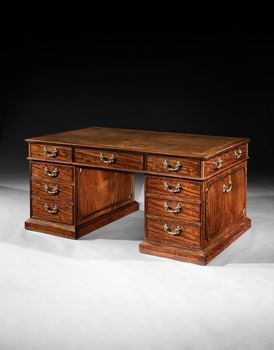 A GEORGE III MAHOGANY PEDESTAL DESK ALMOST CERTAINLY BY THOMAS CHIPPENDALE