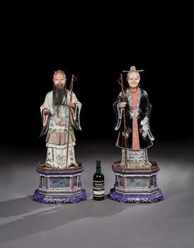 A PAIR OF GEORGE III PERIOD CHINESE EXPORT POLYCHROME DECORATED CLAY NODDING FIGURES