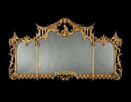 A GEORGE III GILTWOOD OVERMANTEL MIRROR ATTRIBUTED TO THOMAS JOHNSON