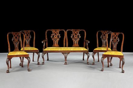 A SUITE OF GEORGE II MAHOGANY SIDE CHAIRS WITH SETTEE